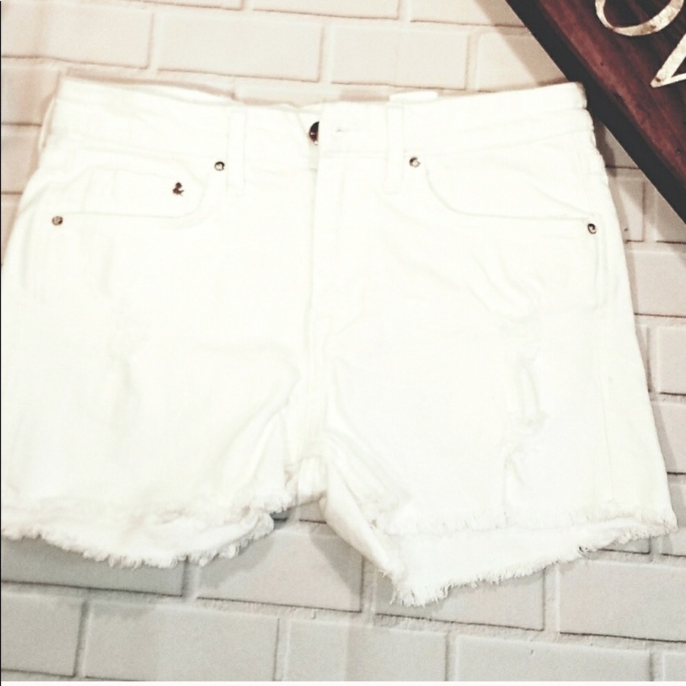 White denim distressed shorts